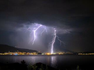 lightning over the city in the night