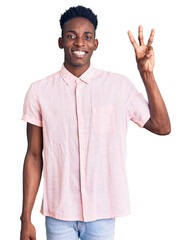 Young african american man wearing casual clothes showing and pointing up with fingers number three while smiling confident and happy.