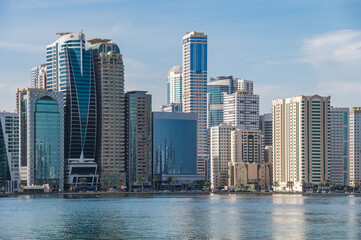 Panorama of the center of the Emirate of Sharjah, United Arab Emirates . Corniche area of Sharjah, UAE city.