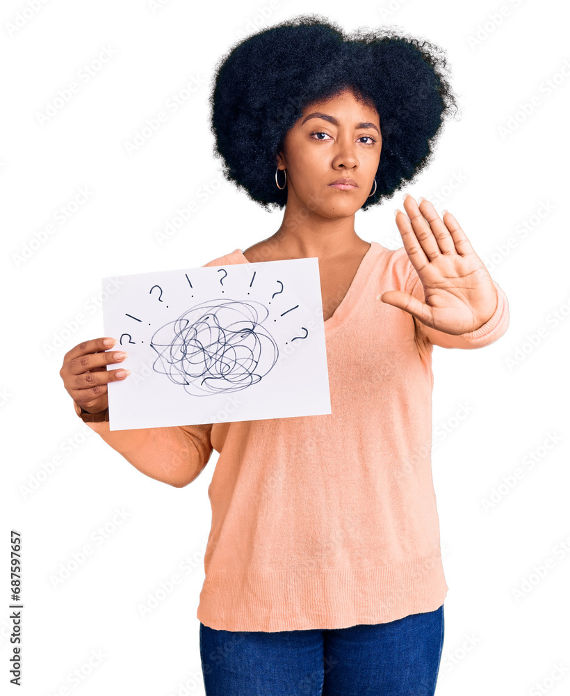 Wall mural Young african american girl holding scribble draw with open hand doing stop sign with serious and confident expression, defense gesture