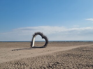 Hear shape on the beach