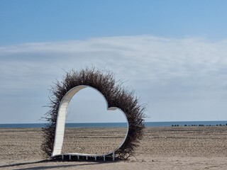 Hear shape on the beach
