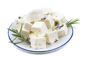 cbes of Feta cheese isolated on white background clipping Heap of Feta cheese, basil leaves and...