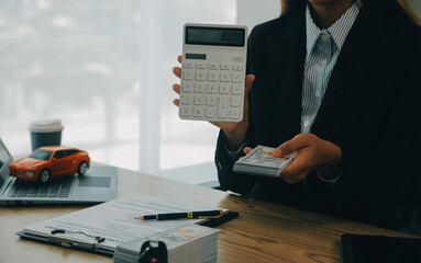 Salesman send key to customer after good deal agreement, successful car loan contract buying or selling new vehicle.