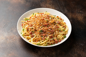 Spaghetti With Toasted Breadcrumbs, bacon and parmesan cheese.