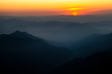 Colorful landscape background at sunrise in the Asir Mountains in Saudi Arabia.