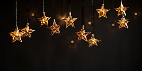 Elegant Hanging Golden Stars and Glowing Bokeh Lights on a Dark Festive Background &ndash; Christmas or New Year Celebration Concept