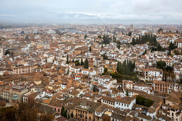 Fototapeta na wymiar View of the city of Granada from the top of the hill where is the Alhambra Palace. Granada, Spain.