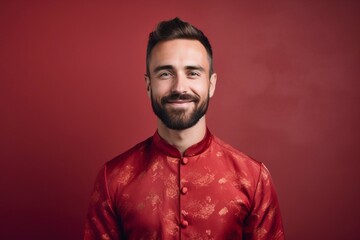 Young european man smiling, wearing cheongsam, one color background, copy space. generative ai
