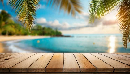 Papier Peint photo Spa top of wood table with seascape and palm leaves blur bokeh light of calm sea and sky at tropical beach background empty ready for your product display montage summer vacation background concept