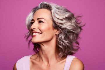 Naklejka premium Portrait of a woman isolated on a pink background