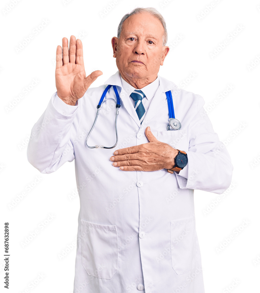 Wall mural Senior handsome grey-haired man wearing doctor coat and stethoscope swearing with hand on chest and open palm, making a loyalty promise oath