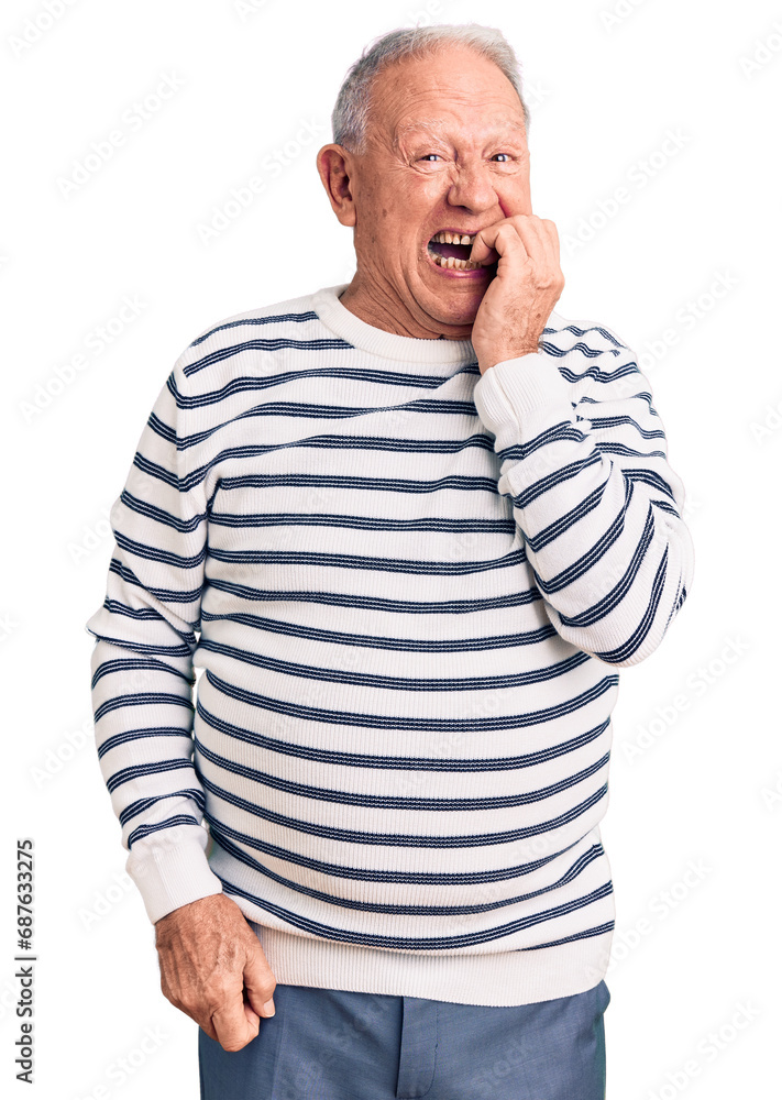 Poster Senior handsome grey-haired man wearing casual striped sweater looking stressed and nervous with hands on mouth biting nails. anxiety problem.