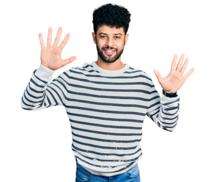Young arab man with beard wearing casual striped sweater showing and pointing up with fingers number ten while smiling confident and happy.