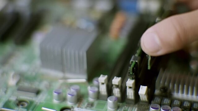 Installing RAM Memory Module into Motherboard Slot. Upgrading Computer Hardware