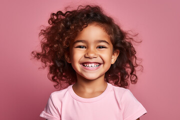 Child's portrait, radiant with a delightful smile.