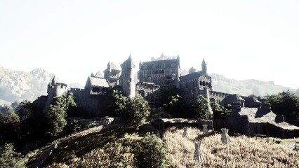 Old ruined castle in the misty mountains