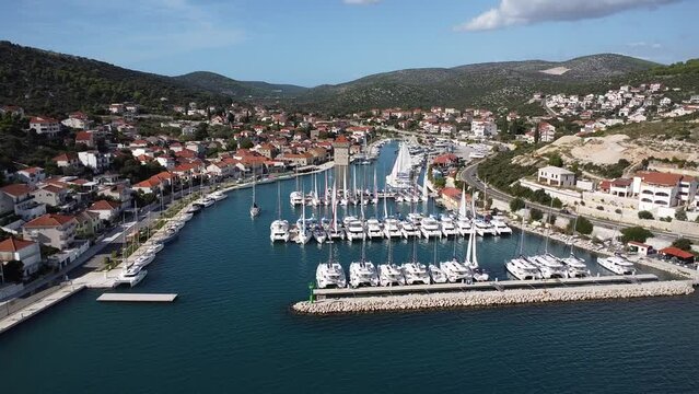 The shot of harbor with the sailboats and yachts in Bilo on the Adriatic Sea - backward footage - not edited or color graded