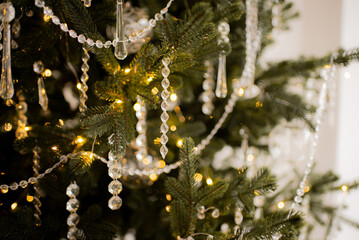 Christmas tree decoration cozy garland. tradition and celebration concept.