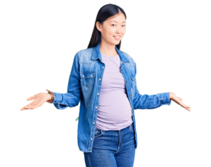 Young beautiful chinese woman pregnant expecting baby smiling showing both hands open palms, presenting and advertising comparison and balance