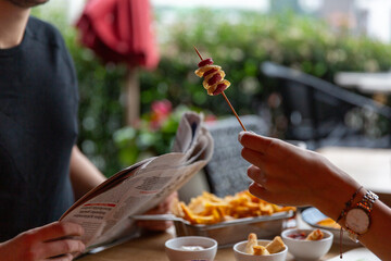 a nice breakfast with your lover, a cozy atmosphere crispy chips and sausages