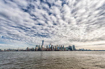 Hudson River and Manhattan Cityscape with One World Trade Center in Background. NYC, USA