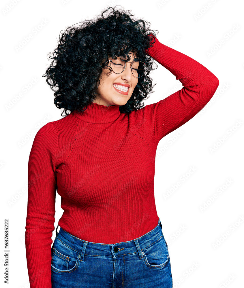 Poster young middle east girl wearing casual clothes and glasses smiling confident touching hair with hand 