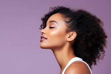 A close up of a woman 's face with her eyes closed