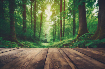 Empty wooden table with green forest background