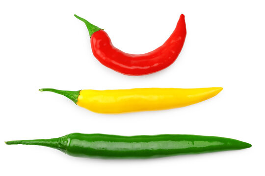 three red green yellow hot chili peppers isolated on white background. clipping path. top view