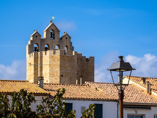 The bell tower of the Church of the Saintes Maries de la Mer, a Romanesque fortified church built...