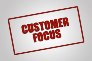 Customer Focus. A red stamp illustration isolated on light grey background.