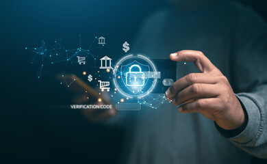 Fototapeta premium Concept of cyber security and online payment, Man holding credit card and using smartphone verification password for online financial transactions, Padlock icon for protection financial information,
