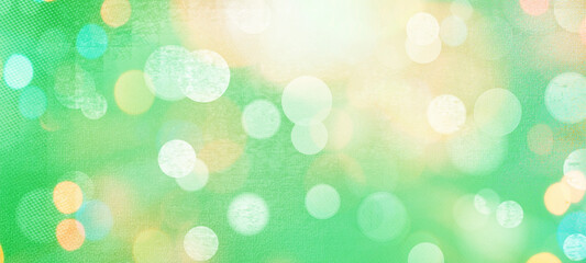 Green widescreen bokeh background for seasonal, holidays, celebrations and various design works