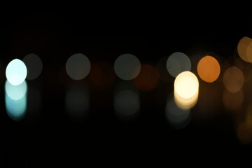 Black background  Horizontal background with blur bokeh effects for christmas time. Special occasion concept with space for text.