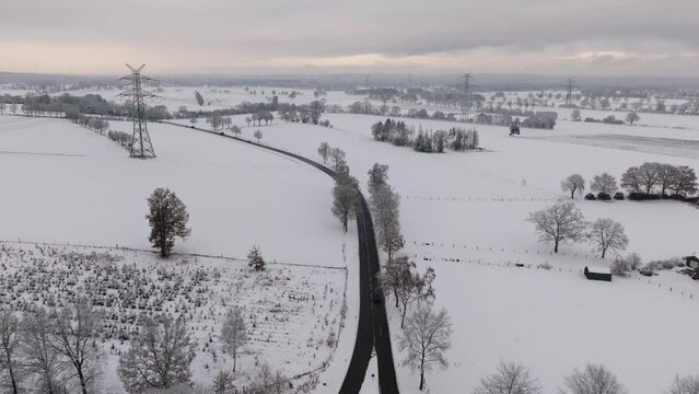 Aerial view of a snowy rural scene in northern germany