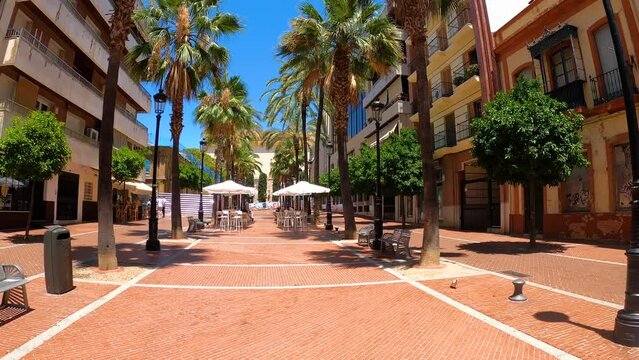 Exploring the city center in summer day in Huelva, Spain