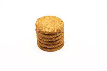 Stack o healthy integral cookies made of oats isolated on white background