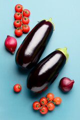 Different fresh vegetables on blue background