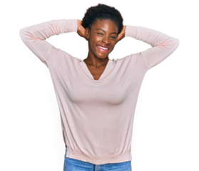 Young african american girl wearing casual clothes relaxing and stretching, arms and hands behind head and neck smiling happy