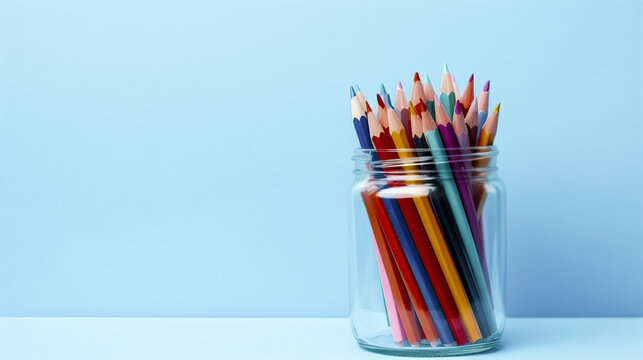 A jar of various colored pencils is placed on a white surface against a solid blue background, creating a vibrant and creative atmosphere. ai generative