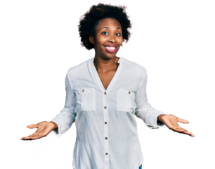 African american woman with afro hair wearing casual white t shirt clueless and confused expression with arms and hands raised. doubt concept.