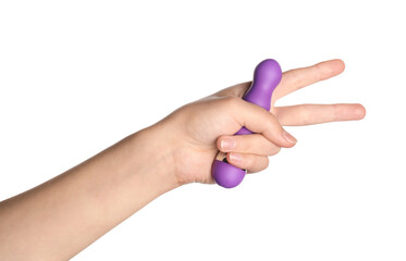 Woman holding vibrator and showing victory gesture on white background, closeup