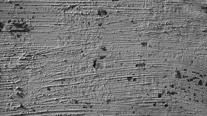gray background, in the photo is plaster on the wall close-up.