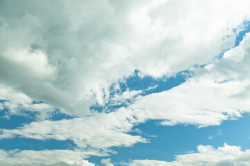 blue sky and clouds close up view from below