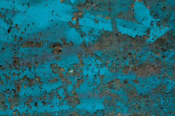 turquoise background, in the photo there is paint on a concrete wall