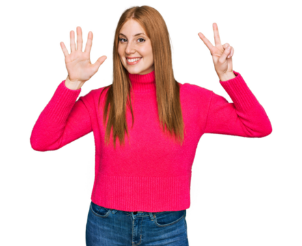 Young irish woman wearing casual clothes showing and pointing up with fingers number seven while smiling confident and happy.