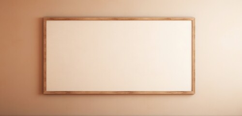 Empty wooden frame on a beige wall, providing a blank canvas for creative exploration.