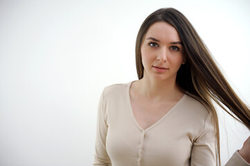 Obraz premium woman brush her long hair. High quality photo