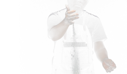 Chef prepare white flour dust for cooking bakery food. Elderly man Chef clap hand, white flour dust explode fly in air. Flour stop motion in air with freeze high speed shutter, black background